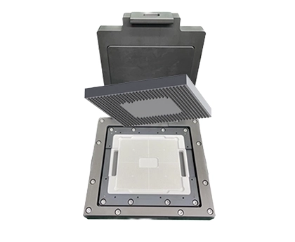 BGA integrated circuit positioned above an open IC test socket prior to engagement